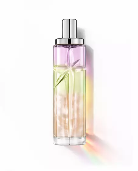 Yummy Swirl : flacon élancé avec dégradé violet, vert et orange sur fond blanc.